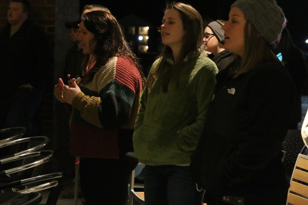 From left: Brittney Kertesz, Ruth Anna Housand, and GWU Campus Ministries intern, Mindy Robinson worshipping to the song "Lord I Need You."