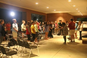 Students gather in worship in preparation for the week of awareness. Photo by Megan Hartman