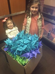 Charlee Rae with 1,000 paper cranes